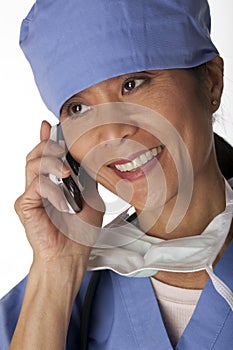 Medical Professional in Scrubs on the Phone