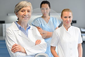 Medical professional team woman at dental surgery