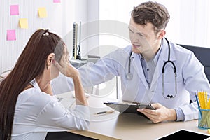 Medical professionals caucasian man reassuring and talking