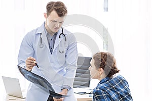 Medical professionals caucasian man reassuring and talking