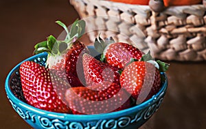 Natural background of red strawberries on the table ready to eat photo