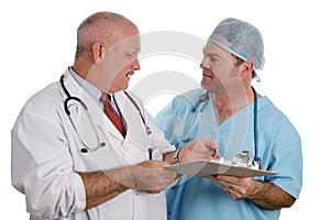 Medical Resident Instructs Intern