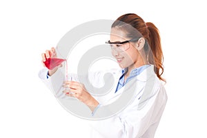 Medical or scientific researcher with flask making test or research.