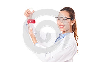 Medical or scientific researcher with flask making test or research.