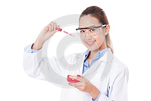 Medical or scientific researcher with flask making test or research.