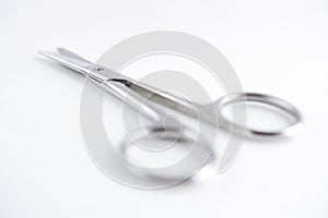 Medical scissors on a white background