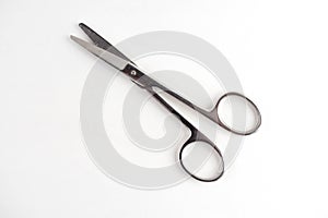 Medical scissors on a white background