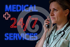 Medical services 24 by 7 concept. Neon glowing signboard and doctor women with phone and stethoscope answers an emergency call