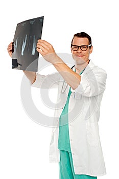 Medical specialist examining patients x-ray