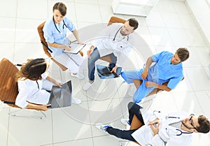 Medical staff ,discussing the work plan with the patients