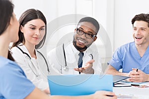 Medical staff having discussion in modern hospital