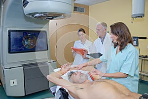 Medical staff looking at imagery patient`s scan