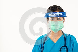 Medical staff nurse wearing a face mask protective and plastic face shield