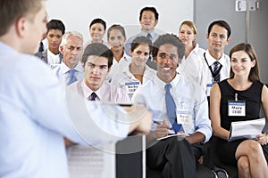 Medical Staff Seated In Circle At Case Meeting