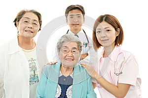 Medical staff with senior women