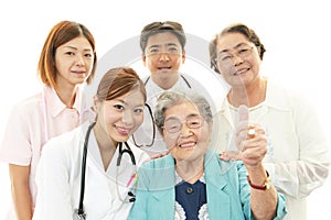 Medical staff with senior women