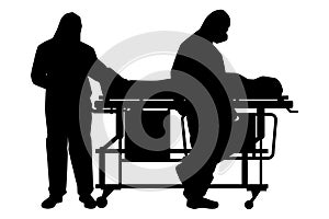 Medical staff wear personal protective equipment PPE with a body of Covid-19 victim for on patient cart silhouette