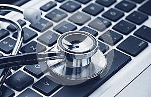 Stethoscope over a laptop keyboard - cybercrime concept image