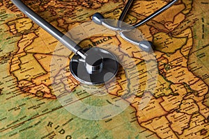 Medical stethoscope over africa healthcheck. close-up map