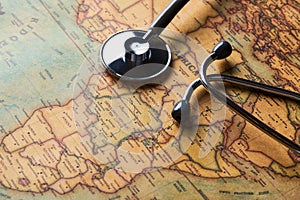 Medical stethoscope over africa healthcheck. close-up map