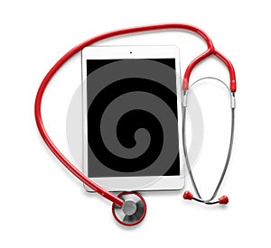 Medical stethoscope with tablet on white background. Health care concept