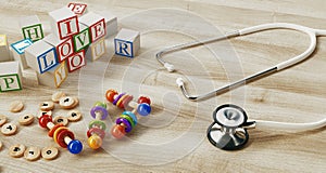 Medical stethoscope and toys on wooden background. 3d rendering