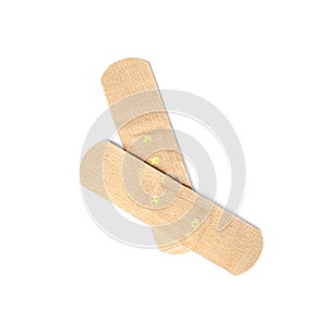 Medical sticking plasters isolated on white. First aid item