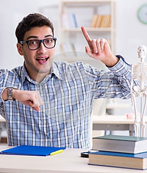 Medical student studying in classroom