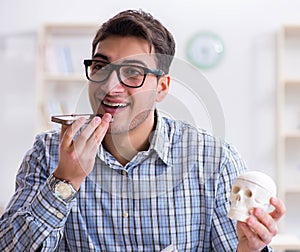 Medical student studying in classroom