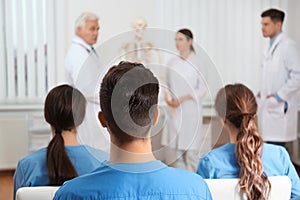 Medical students having lecture in orthopedic