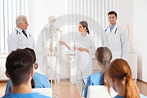 Medical students having lecture in orthopedics