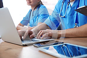 Medical students studying at table