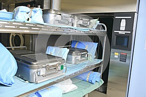 Medical stuff in the sterilizer place in a