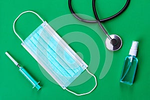 Medical supplies on a colored background as an attribute of the fight against coronavirus