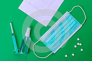 Medical supplies on a colored background as an attribute of the fight against coronavirus