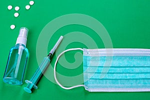 Medical supplies on a colored background as an attribute of the fight against coronavirus