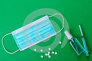 Medical supplies on a colored background as an attribute of the fight against coronavirus