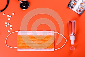 Medical supplies on a colored background as an attribute of the fight against coronavirus