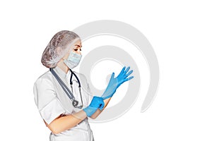 Medical surgeon doctor womanisolated on wihte. Doctor putting on sterile gloves. Place for medical advertise. Medical