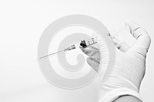 Medical - Syringe with hand and white background