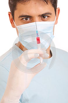 Medical syringe in hands