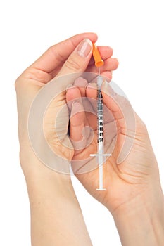 Medical syringe with insulin in hand