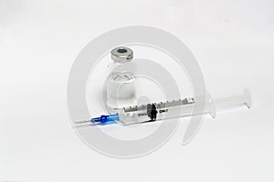 Medical syringe with  liquid on white background