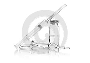 Medical syringe with medicines in ampoules.