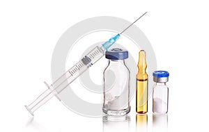 Medical syringe with medicines in ampoules.