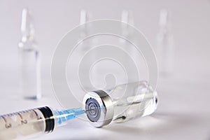 Medical syringe with needle in ampules