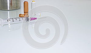 Medical syringe , needle and   ampules background