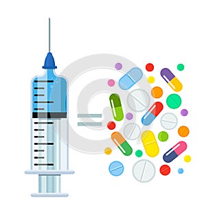 A medical syringe with a needle and medicine inside and a bunch of pills and capsules. The concept of treatment and