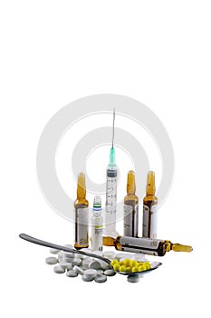 Medical syringe, phials and pills