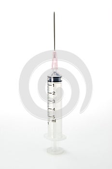 Medical syringe on white background.